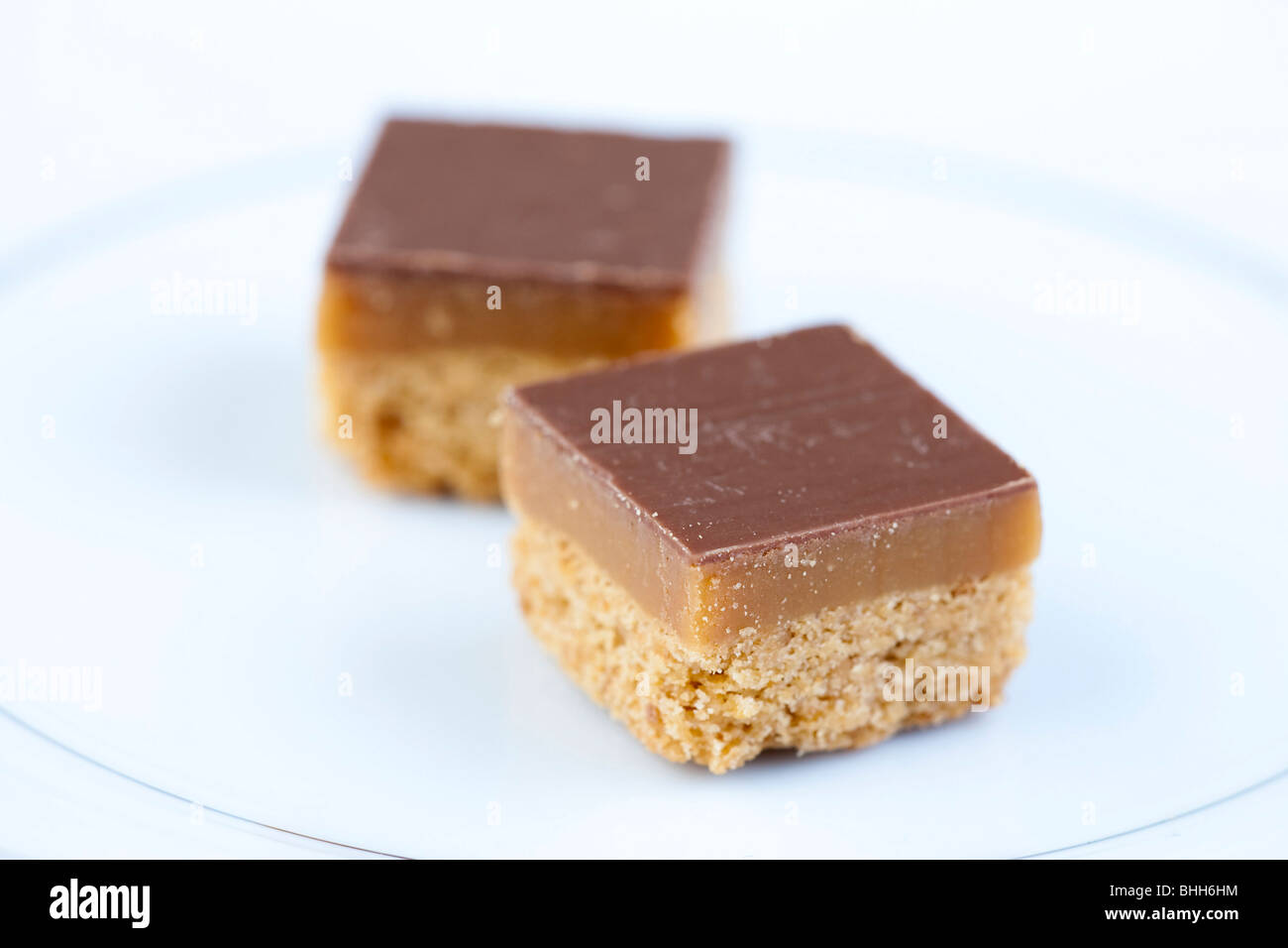 Tranches au caramel enrobées de chocolat Banque D'Images