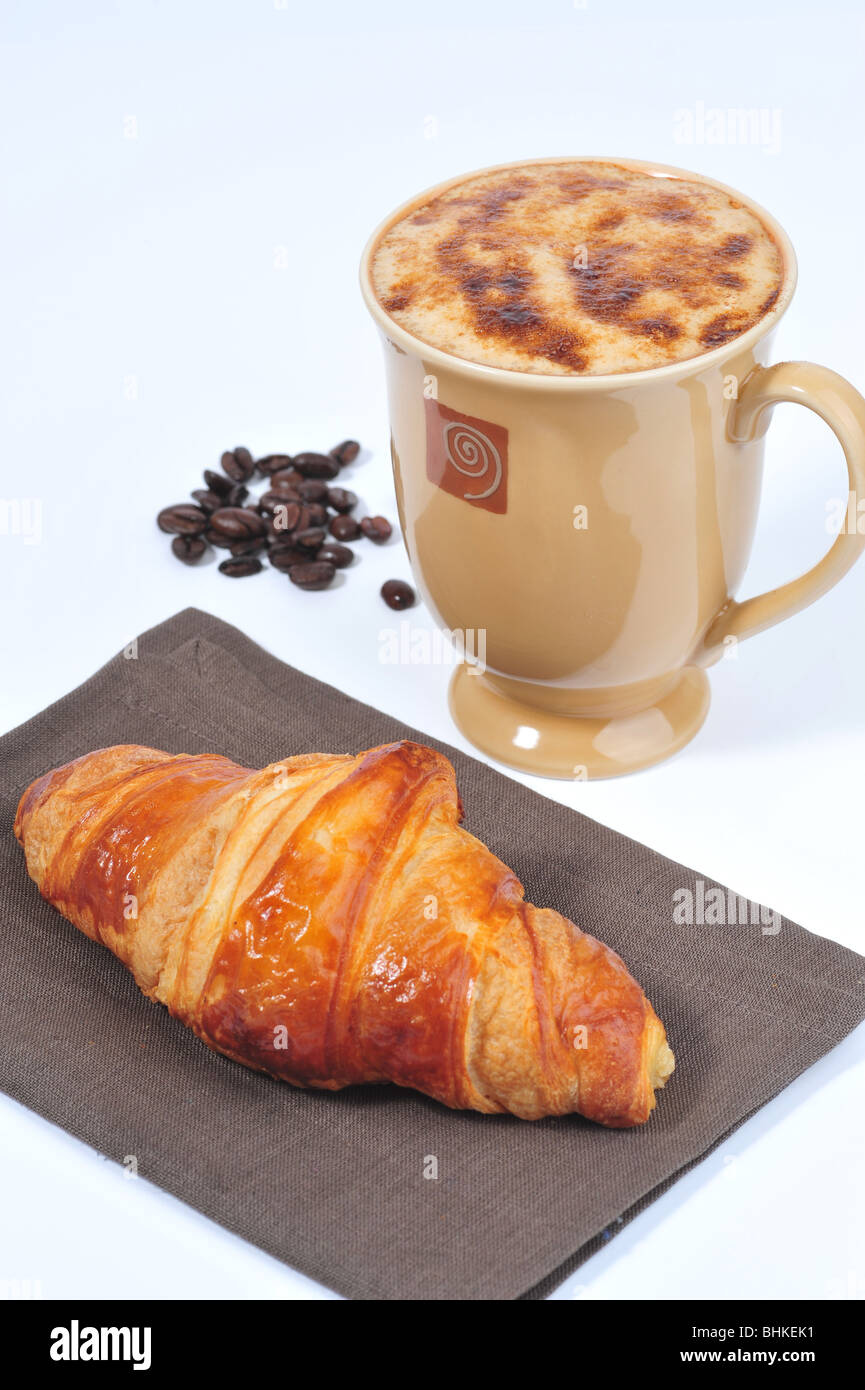 Café avec un croissant Banque D'Images