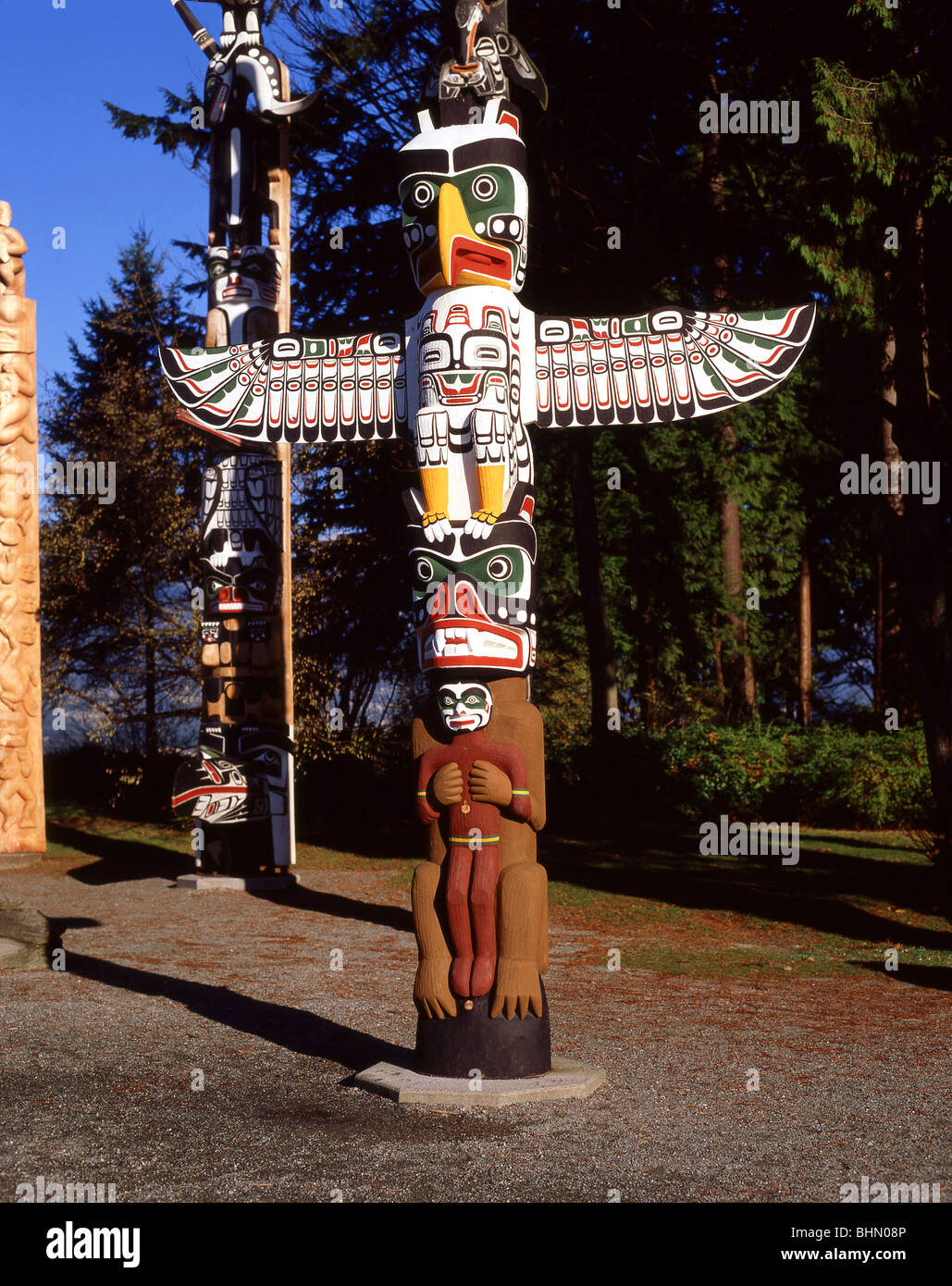Totems dans la région de Brockton Point, le parc Stanley, Vancouver, British Columbia, Canada Banque D'Images