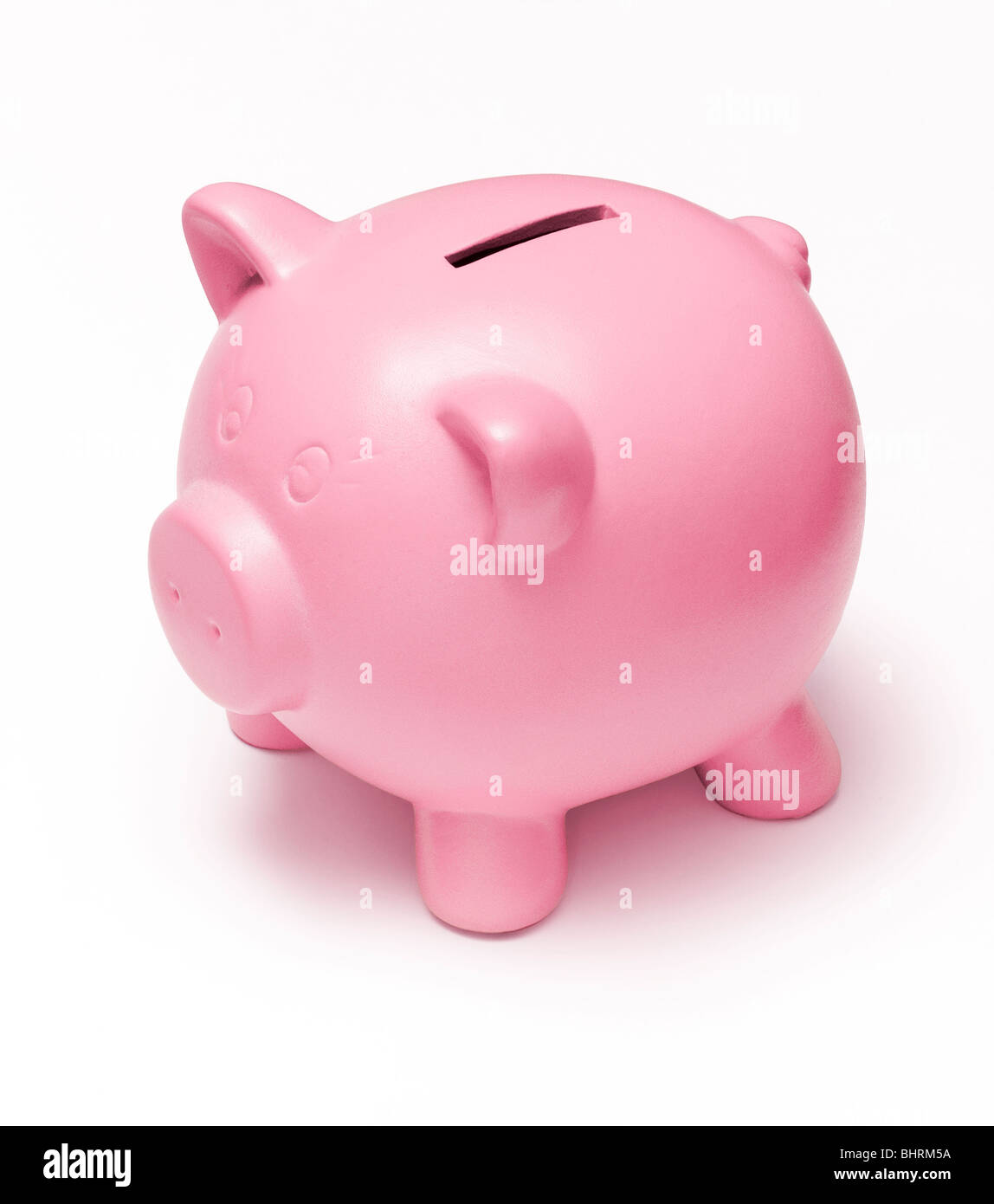 Pink piggy bank sur un fond blanc vue 3/4 Banque D'Images
