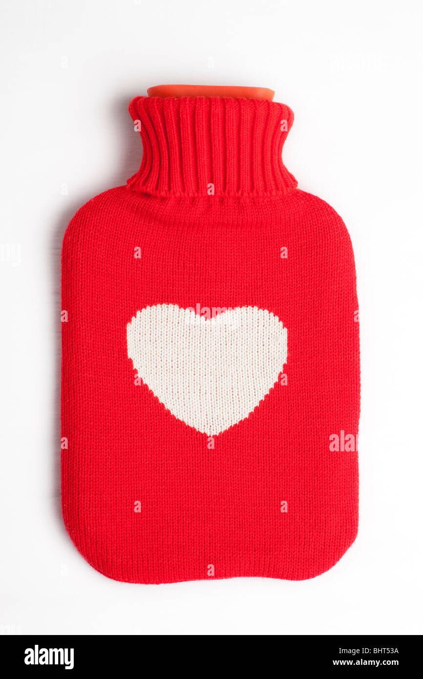 Un coeur couverts hot water bottle Banque D'Images