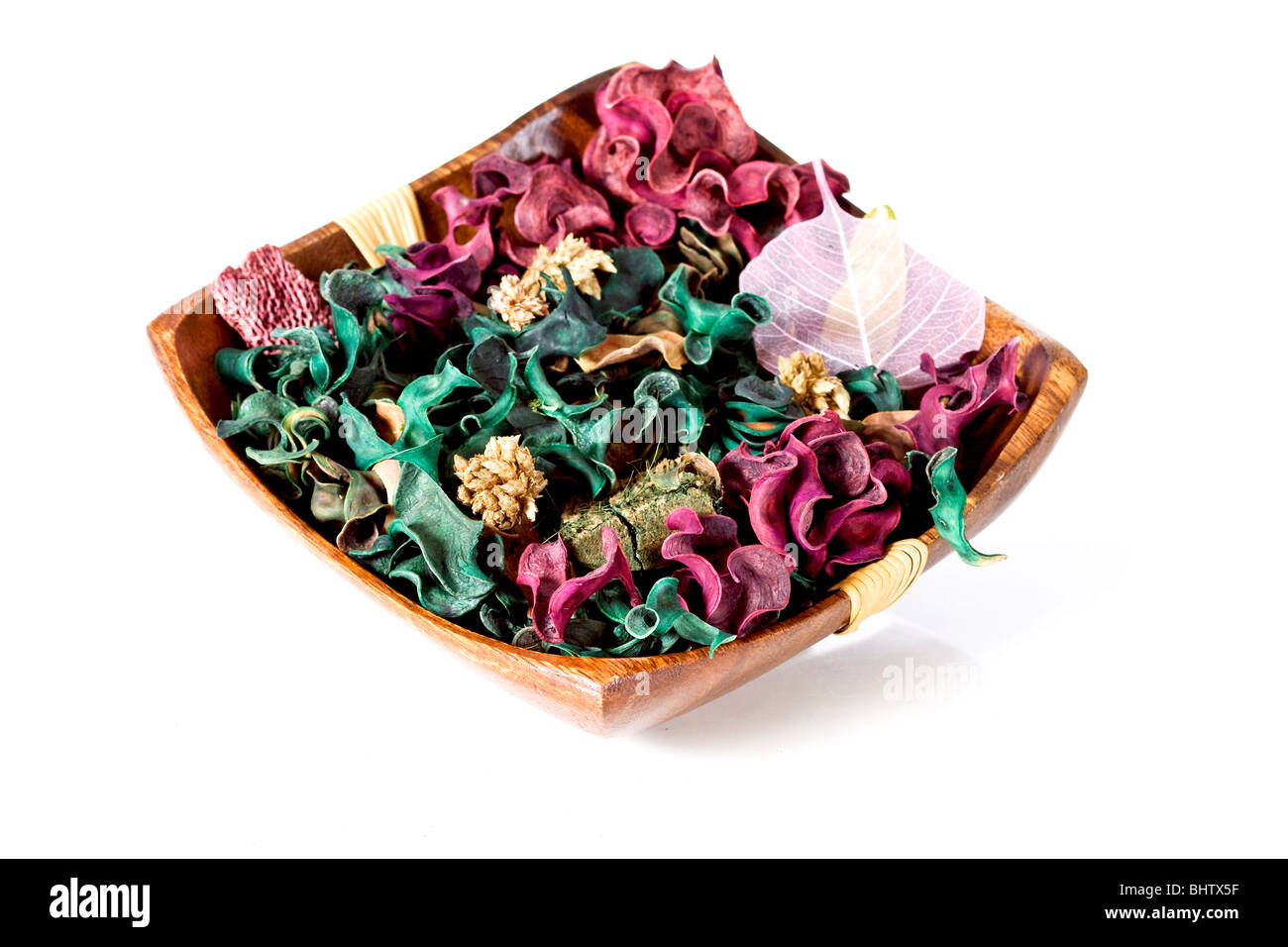 Fleurs séchées dans un bol en bois Banque D'Images