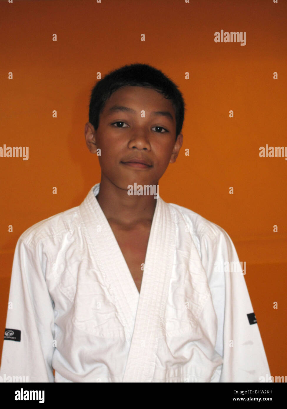 Garçon avec ceinture verte de judo Photo Stock - Alamy