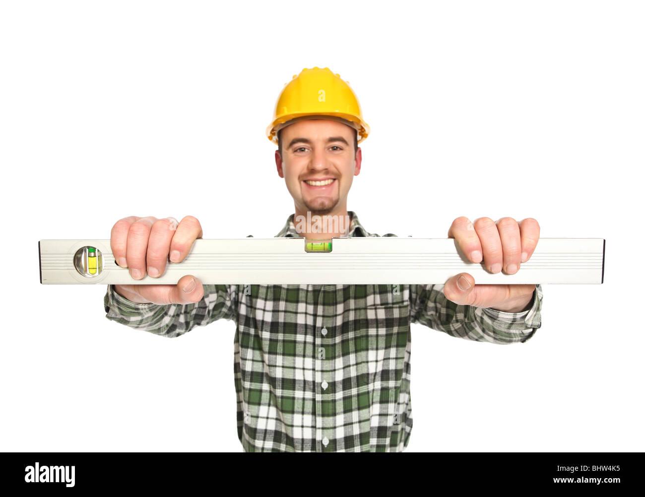 Travailleurs manuels, maintenir le niveau à bulle d'isolé sur fond blanc Banque D'Images