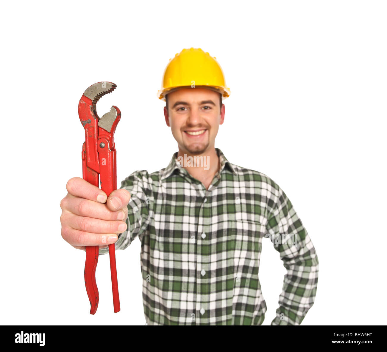 Certains travailleurs manuels, avoir une grosse clé rouge isolated on white Banque D'Images