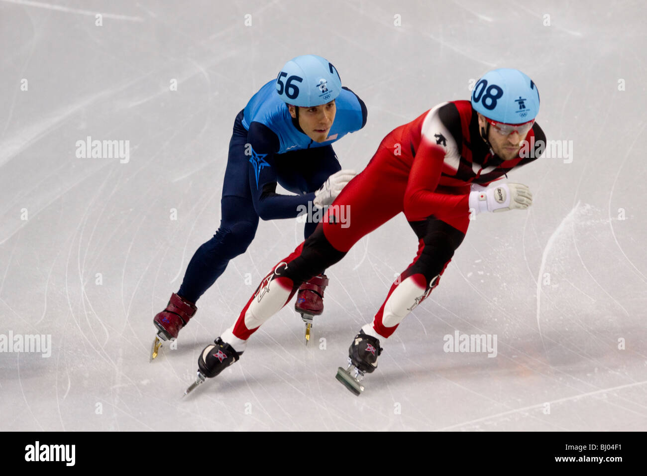 Francois-Louis Tremblay (CAN) et d'Apolo Anton Ohno (USA) qui se font concurrence sur le patinage de vitesse courte piste men's 500m Banque D'Images