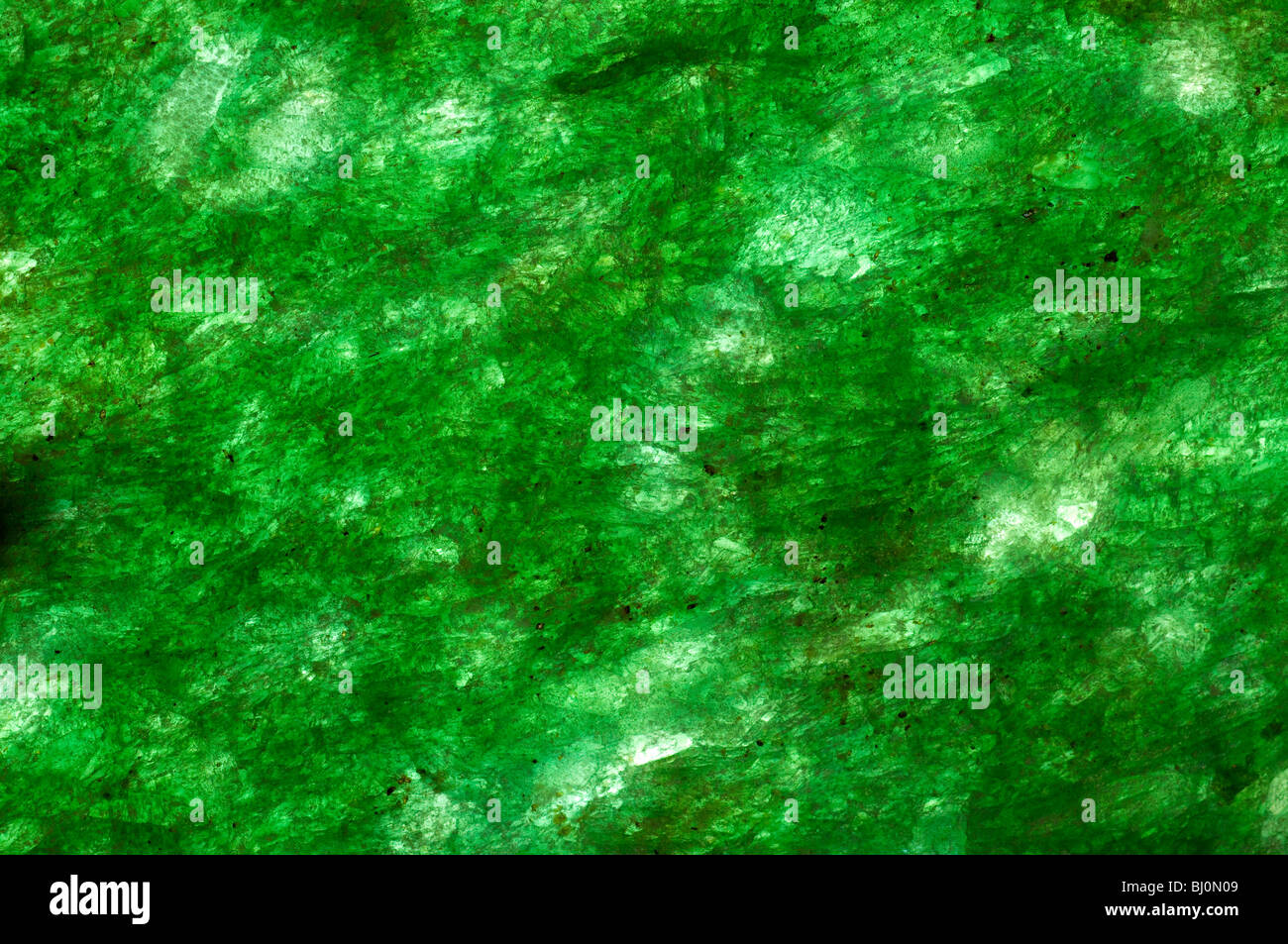 Une section fine d'olivine photographiée en lumière transmise Banque D'Images