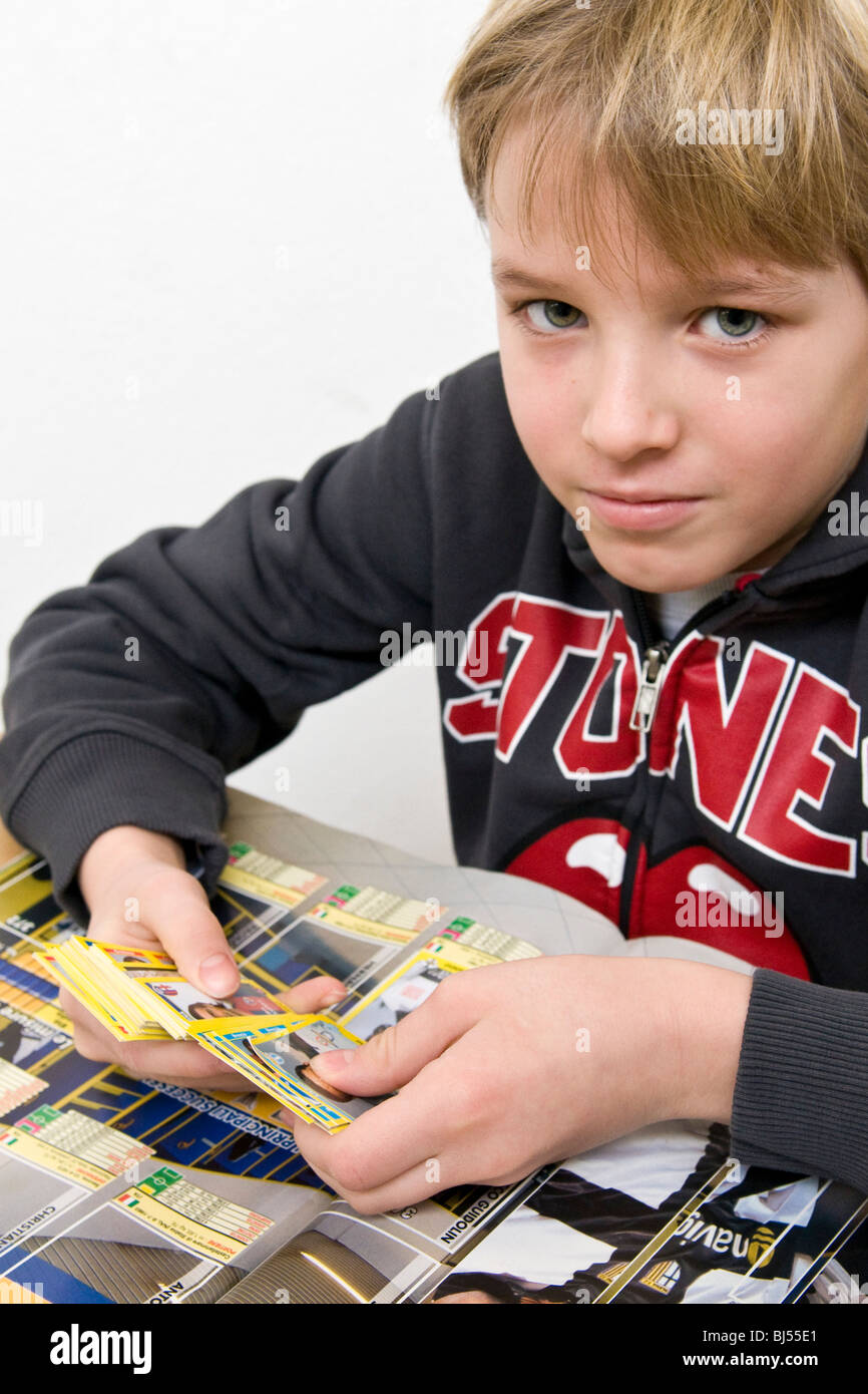 Cartes de collection football avec enfant Banque D'Images