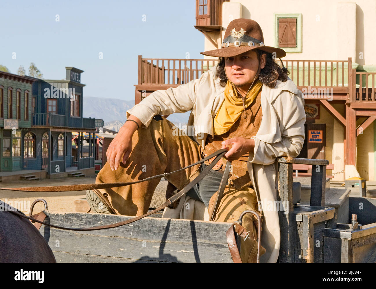 Cowboy assis sur un chariot sur le plateau de tournage Espagne Banque D'Images