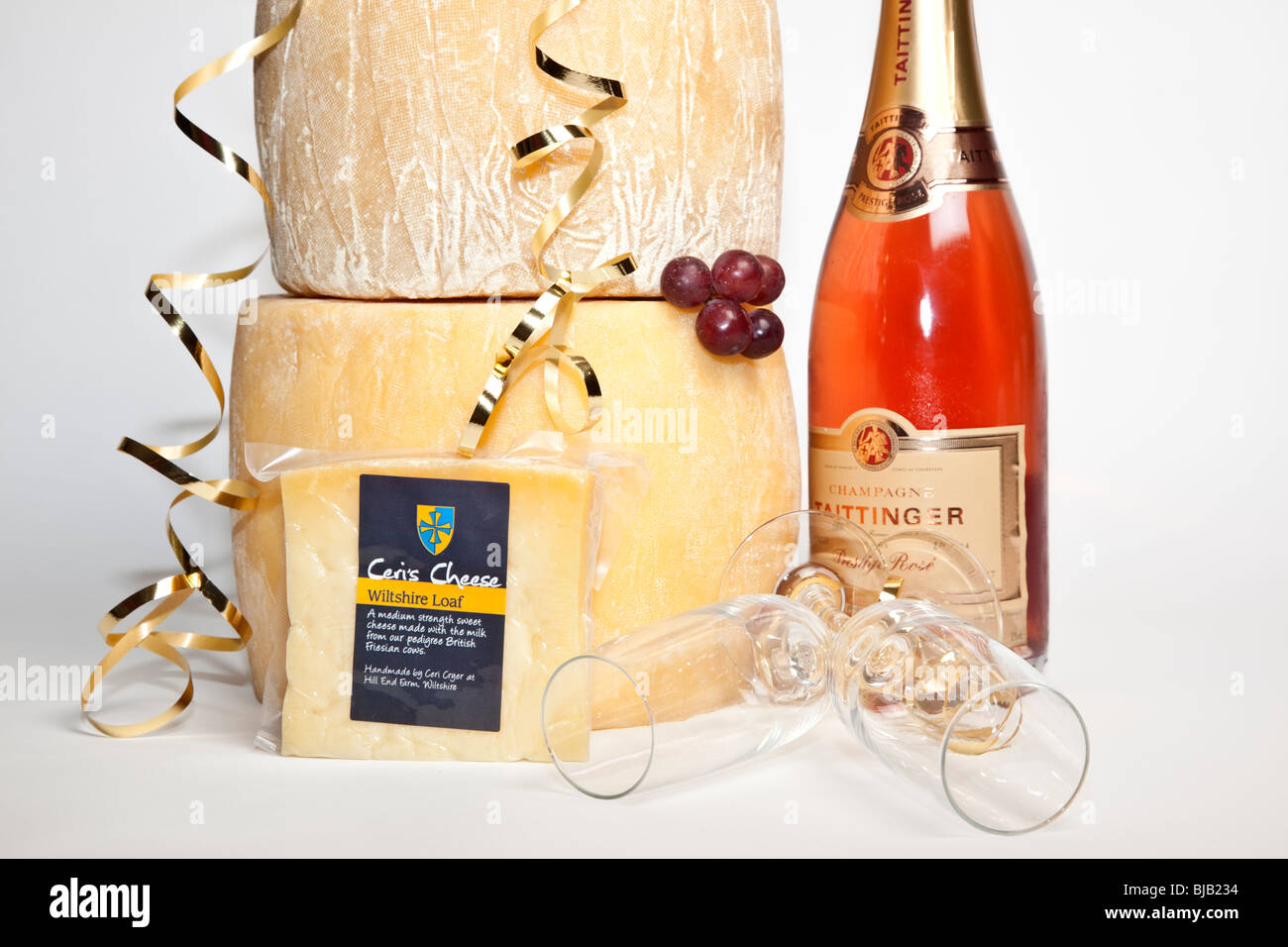 Fromage et champagne rose Banque D'Images