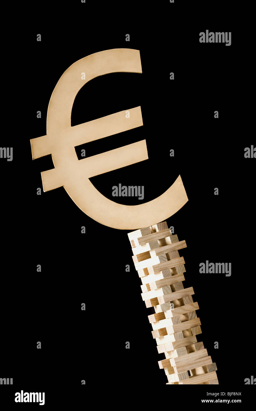 Symbole monétaire sur une tour de blocs Banque D'Images