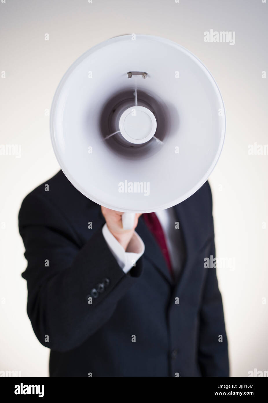 Businessman speaking en poche Banque D'Images