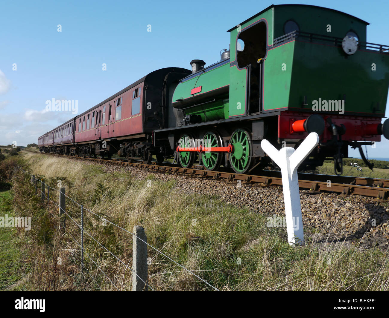 Ce train à vapeur offre un service régulier entre les villes de Holt et Sheringham, Norfolk, UK Banque D'Images