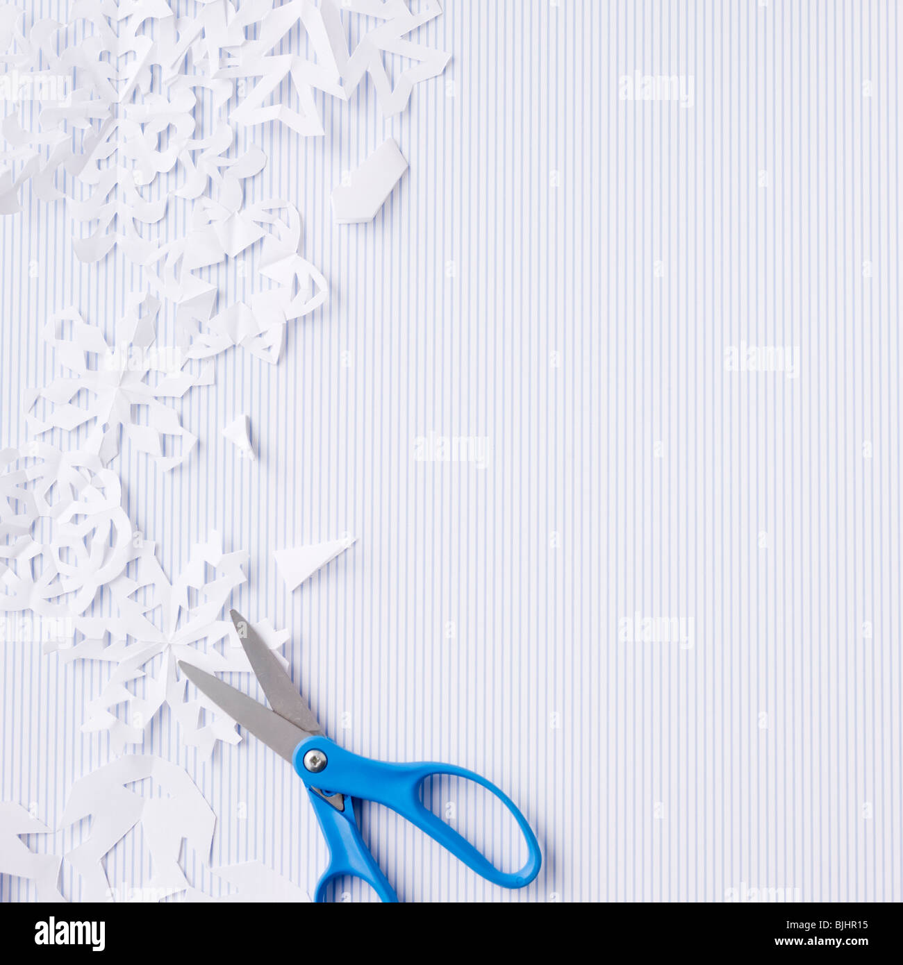 Flocons de papier et ciseaux Banque D'Images