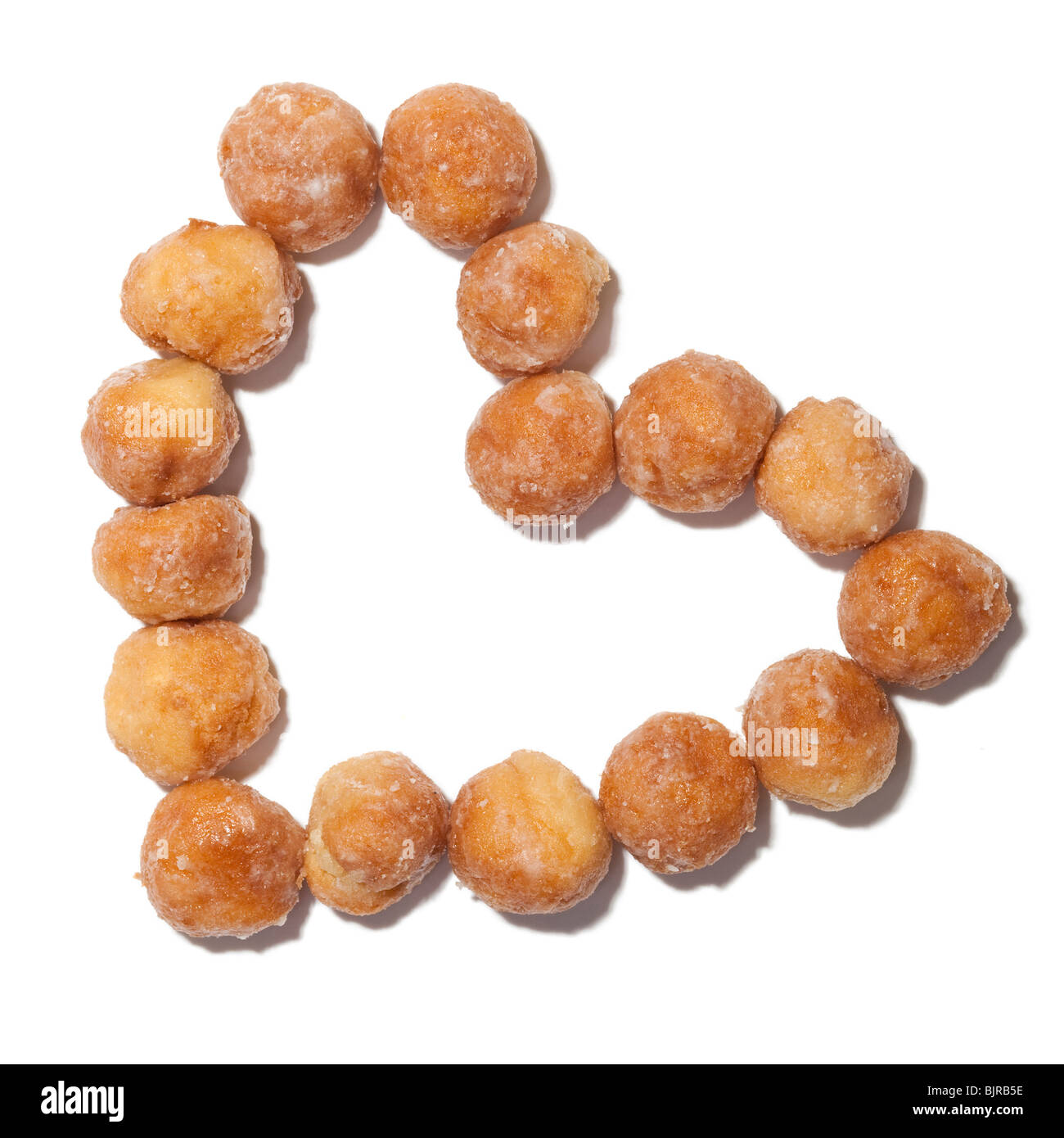 Donuts formé en forme de cœur, vue de dessus, studio shot Banque D'Images