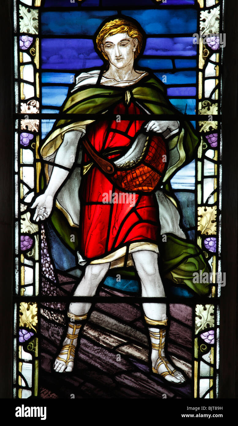 Un vitrail par William Morris & Co, représentant le Semeur de semences, Matthieu 13 : 3, l'église St Mary, au sud, Walsham Norfolk Banque D'Images