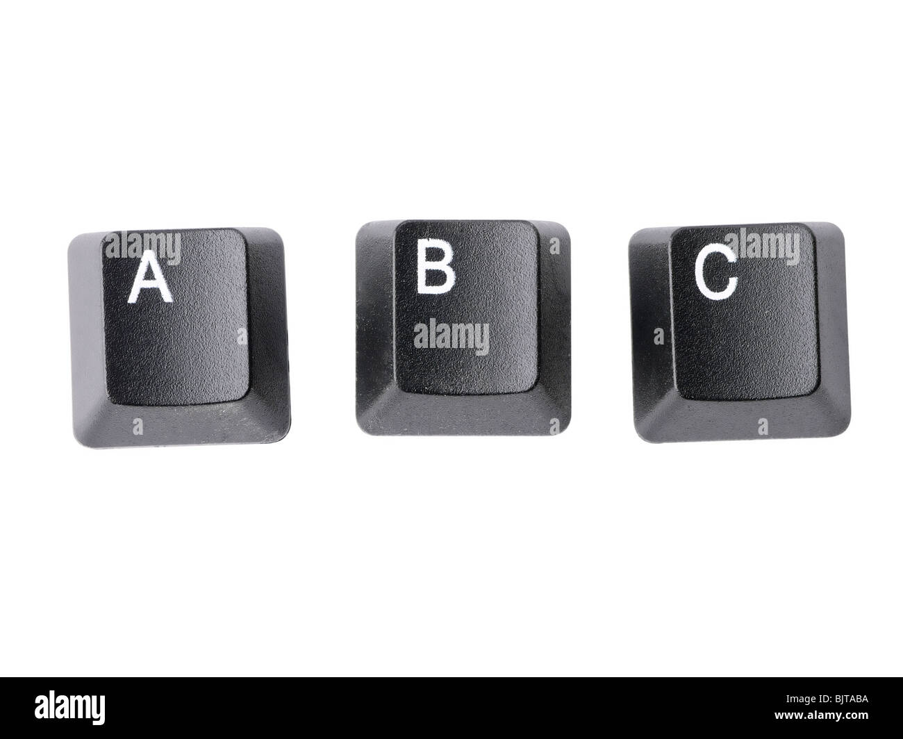 Trois touches de clavier noir formant des premières lettres de l'alphabet ABC sur fond blanc Banque D'Images