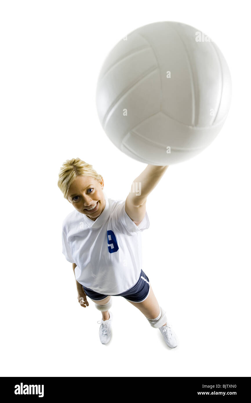 Joueur de volley-ball avec ballon de droit Banque D'Images