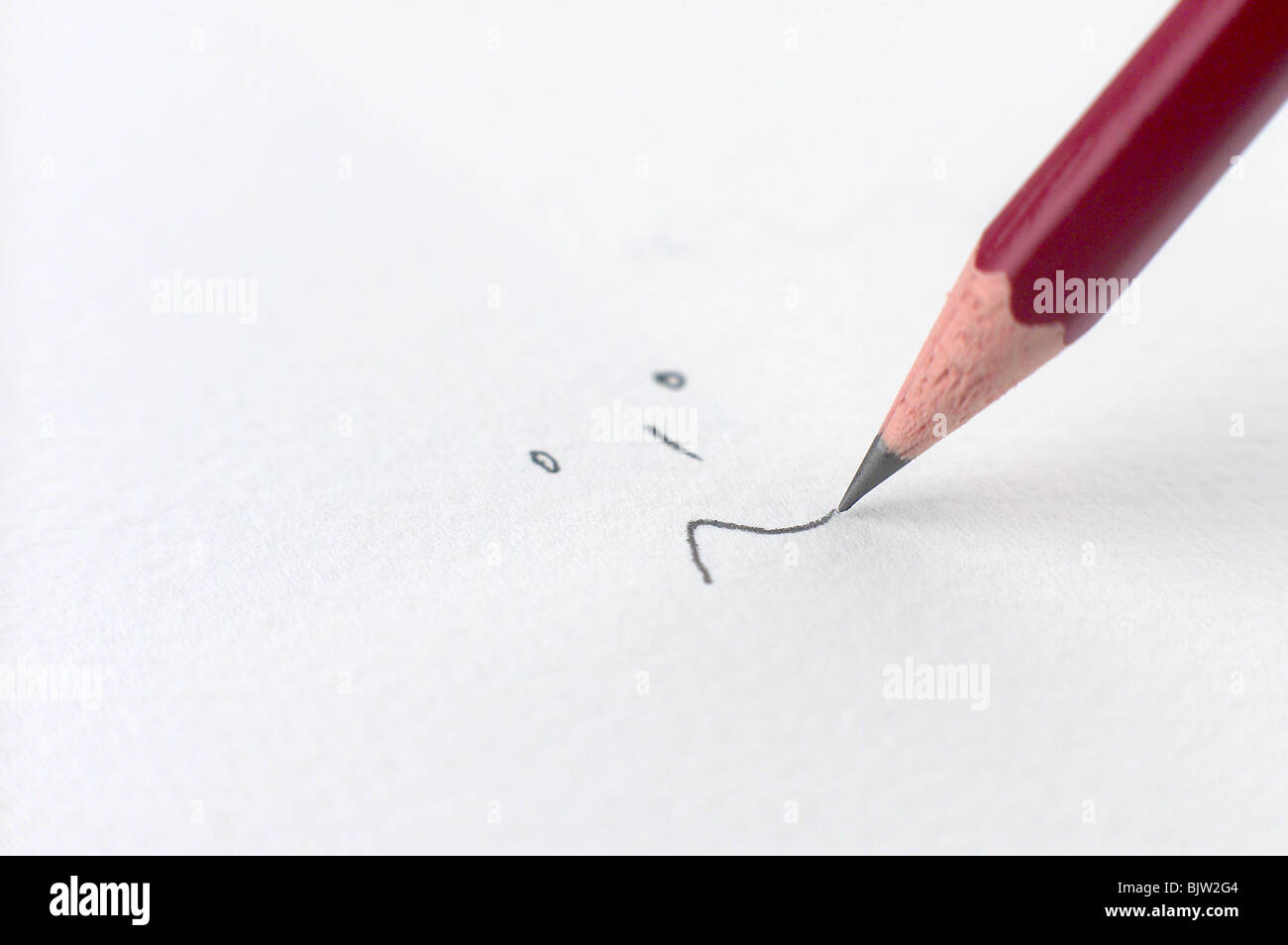 Dessin au crayon rouge sur papier aquarelle blanc Photo Stock - Alamy