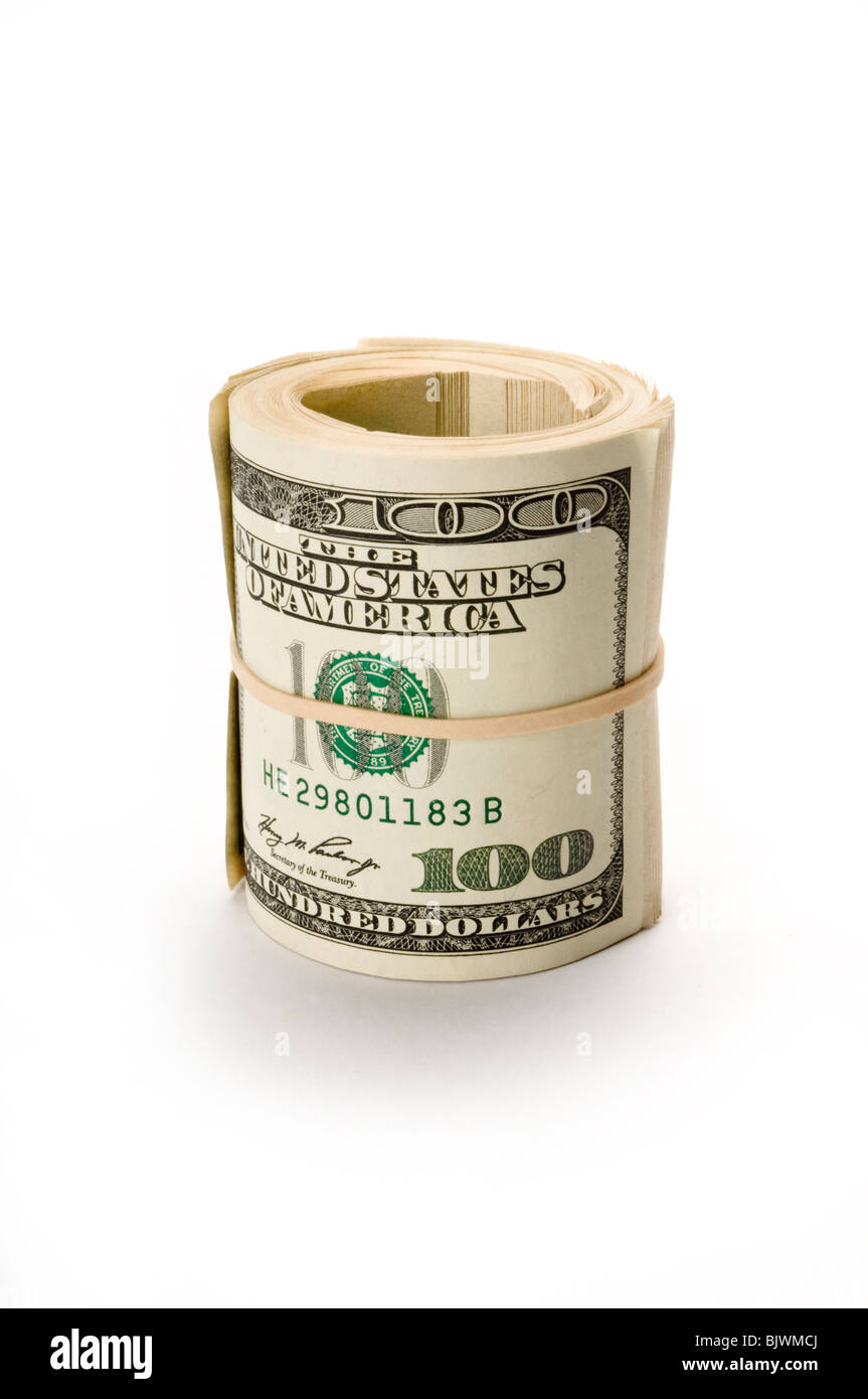 Rouleau de dollar bills on white Banque D'Images