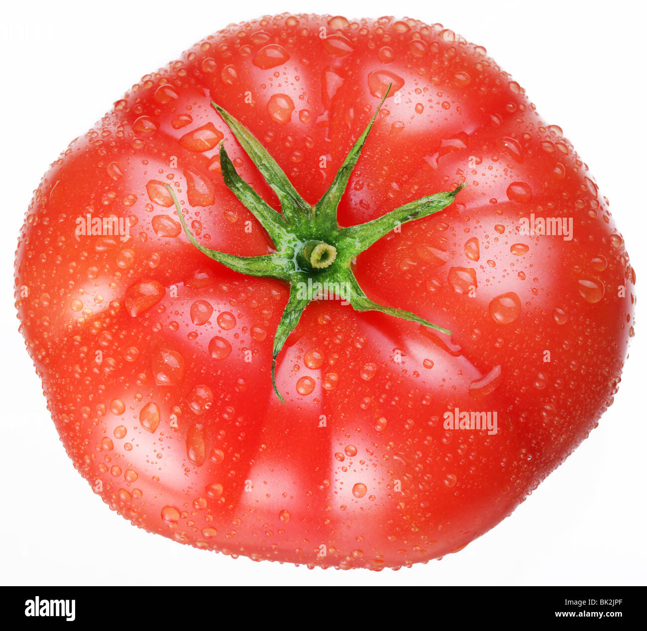 Tomates mûres sur un fond blanc Banque D'Images
