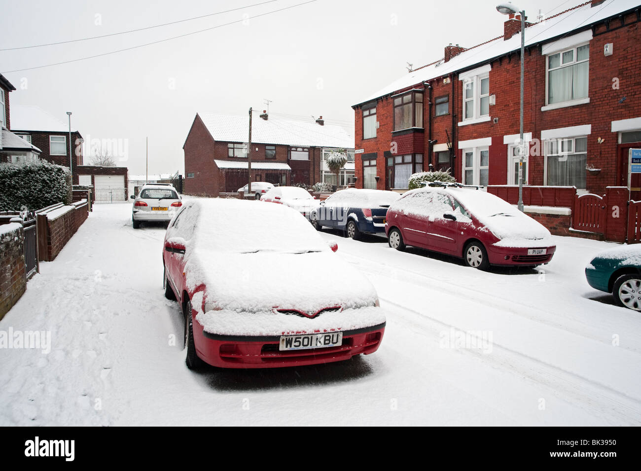 Route en hiver, Denton, Manchester, UK Banque D'Images