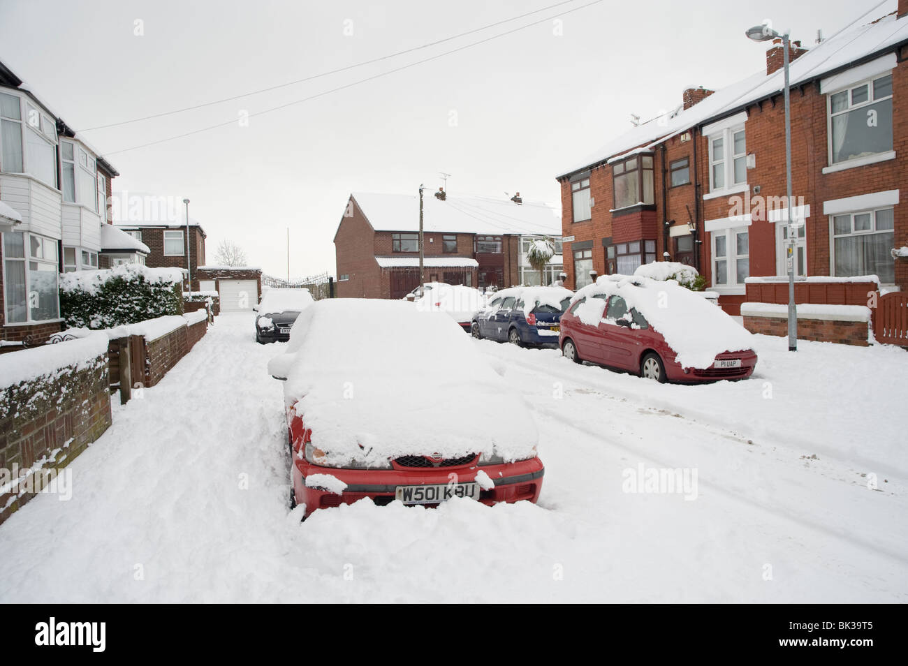 Route en hiver, Denton, Manchester, UK Banque D'Images