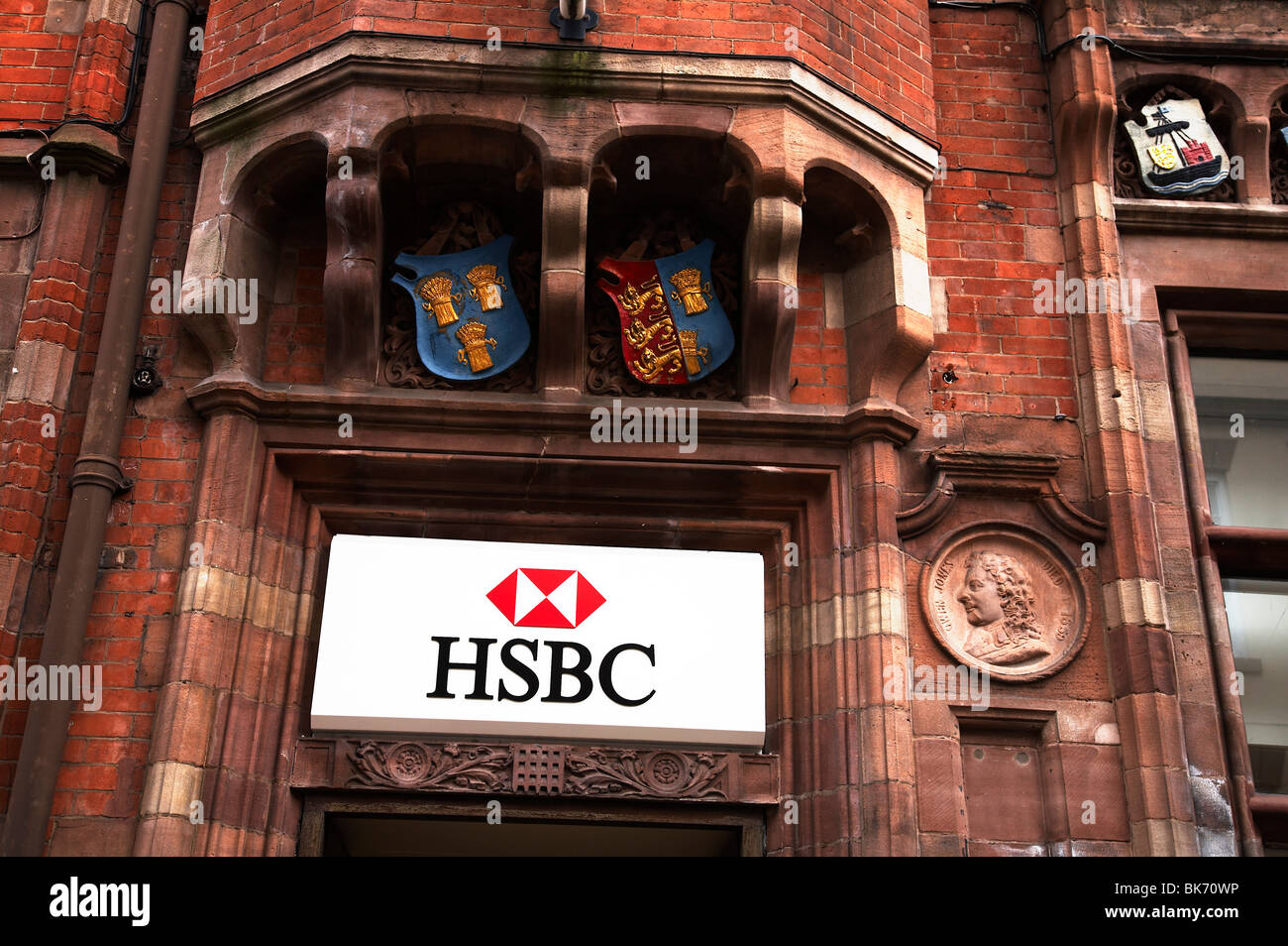 Signe de la HSBC sur mur Banque D'Images