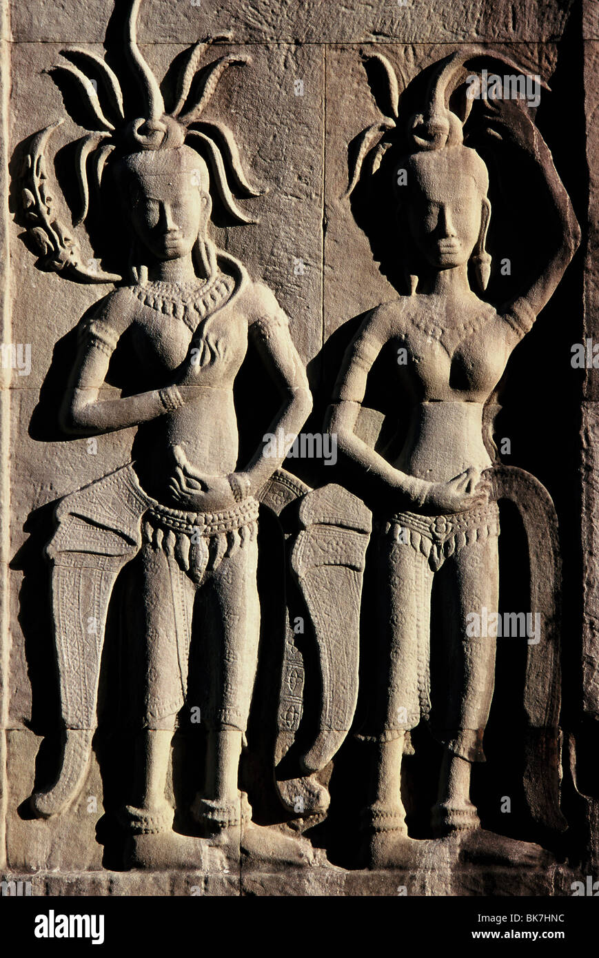 Détail de reliefs du début du xiie siècle avec des ajouts plus tard, Angkor Wat, Angkor, Site du patrimoine mondial de l'UNESCO, au Cambodge Banque D'Images