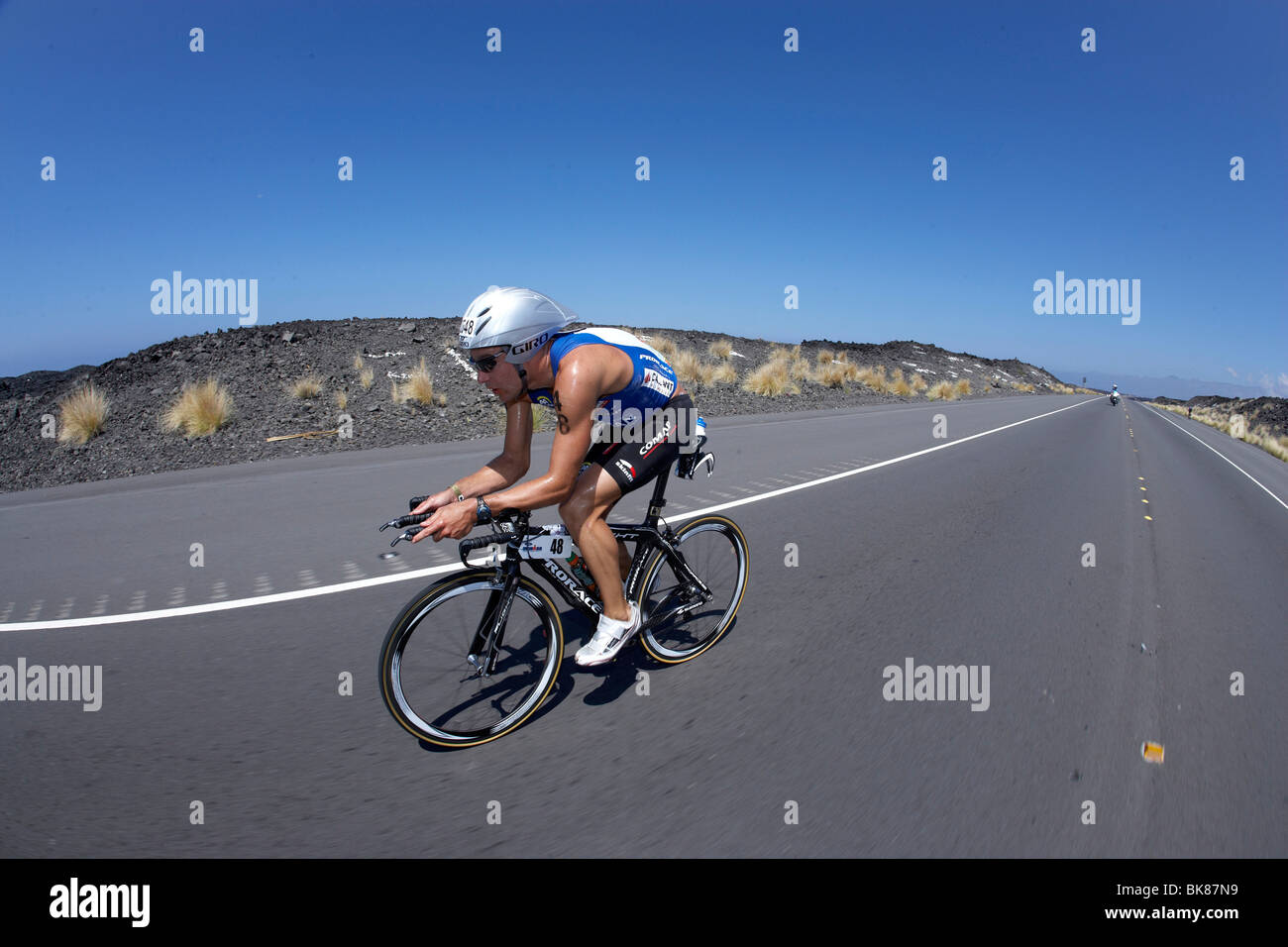 Le triathlète professionnel belge Bert Jammaer sur le parcours vélo du triathlon Ironman World Championship à Kailua-Kona, Haw Banque D'Images
