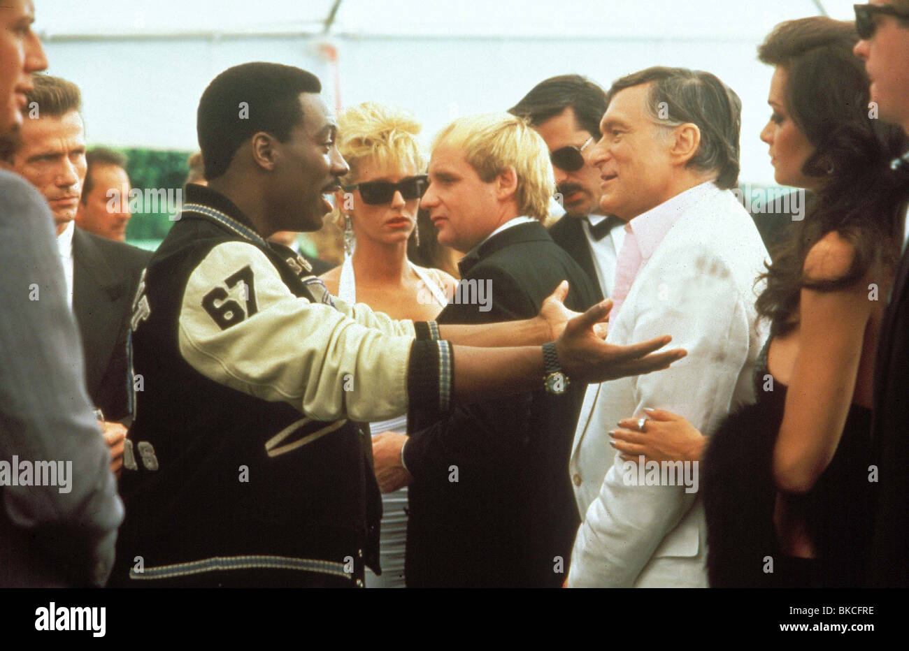 BEVERLY HILLS COP II (1987) BEVERLY HILLS COP 2 (ALT) EDDIE MURPHY, Hugh Hefner BC2 003 L Banque D'Images
