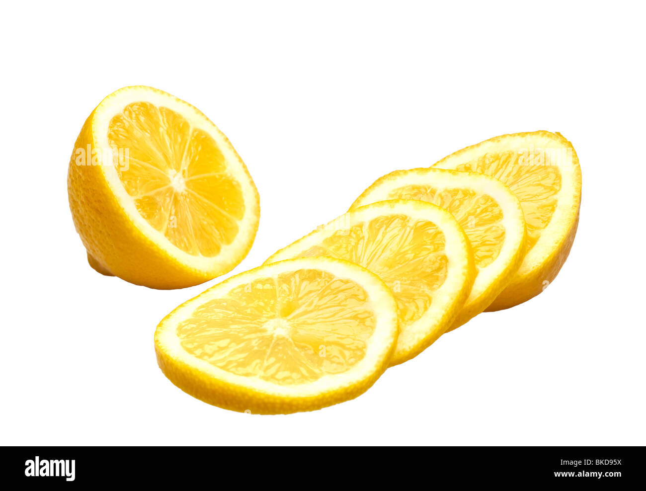 Citrons entières ou coupées en tranches sur blanc Banque D'Images
