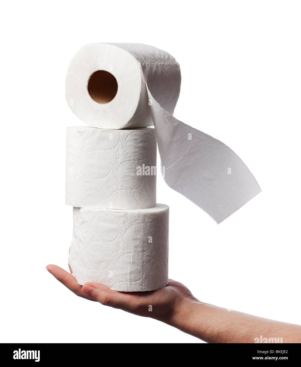 Homme tenant trois rouleaux de papier toilette blanc sur sa main Photo Stock  - Alamy