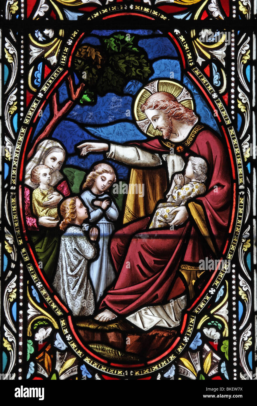Détail d'un vitrail par Ward et Hughes vers 1865, représentant Jésus bénissant des enfants Banque D'Images