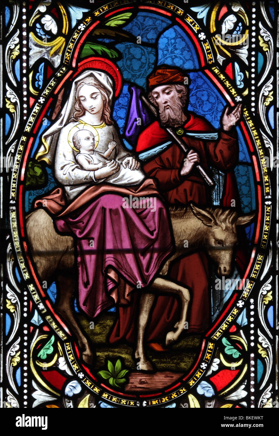 Détail d'un vitrail par Ward et Hughes, vers 1865, représentant 12 des événements de la vie de Jésus Christ ; en vol d'Eqypt Banque D'Images