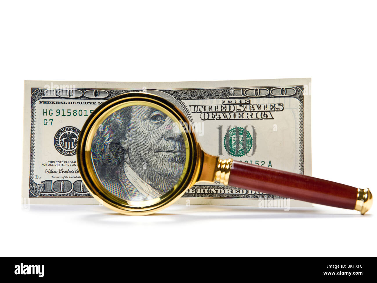 Une centaine de dollars US avec loupe Banque D'Images