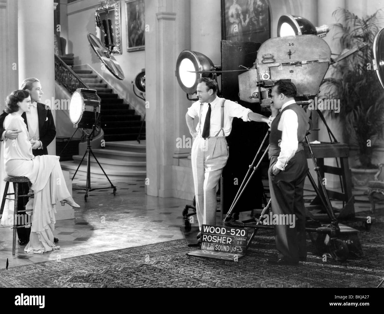 Tournage JOAN CRAWFORD O/S 'PAYÉ (1930)' AVEC KENT DOUGLASS, SAM WOOD (DIR) JCRF 001P Banque D'Images