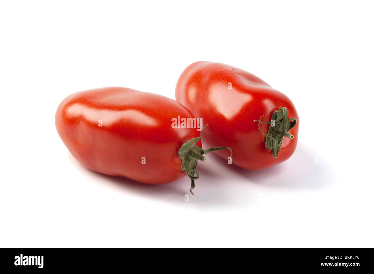 Tomates italiennes sur fond blanc Banque D'Images