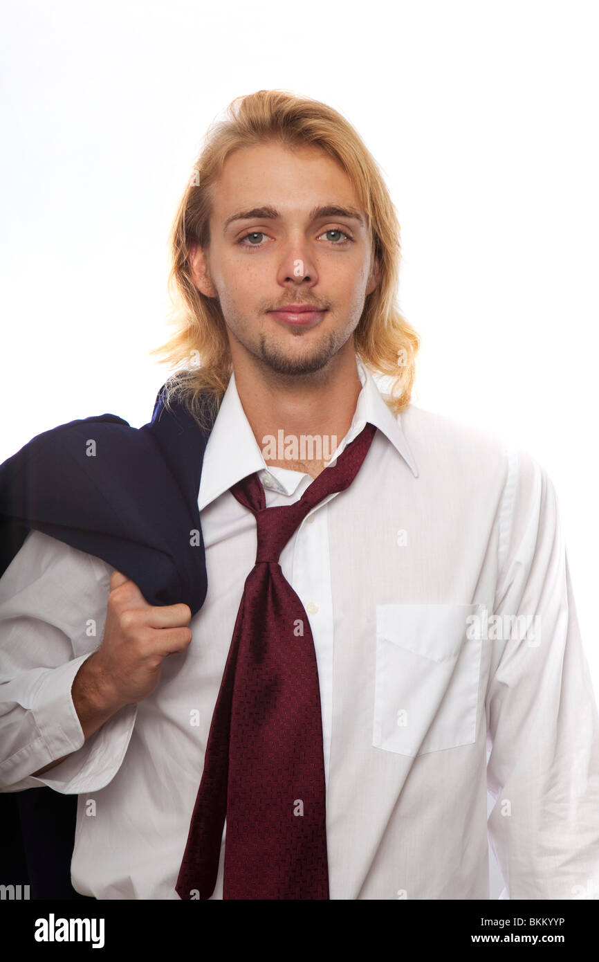 Jeune homme avec veste et cravate desserrée Photo Stock - Alamy