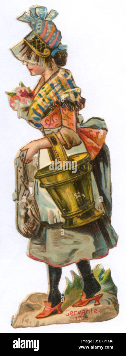 Dame décoratif en costume, portant un seau en métal Banque D'Images