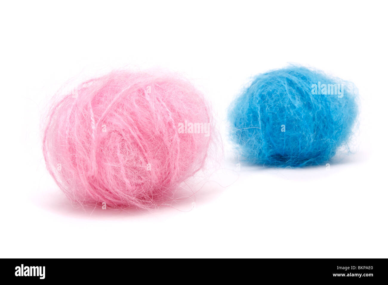 Image conceptuelle de Rose Bébé n Blue laine mohair à illustrer est-ce un garçon ou une fille ? Banque D'Images