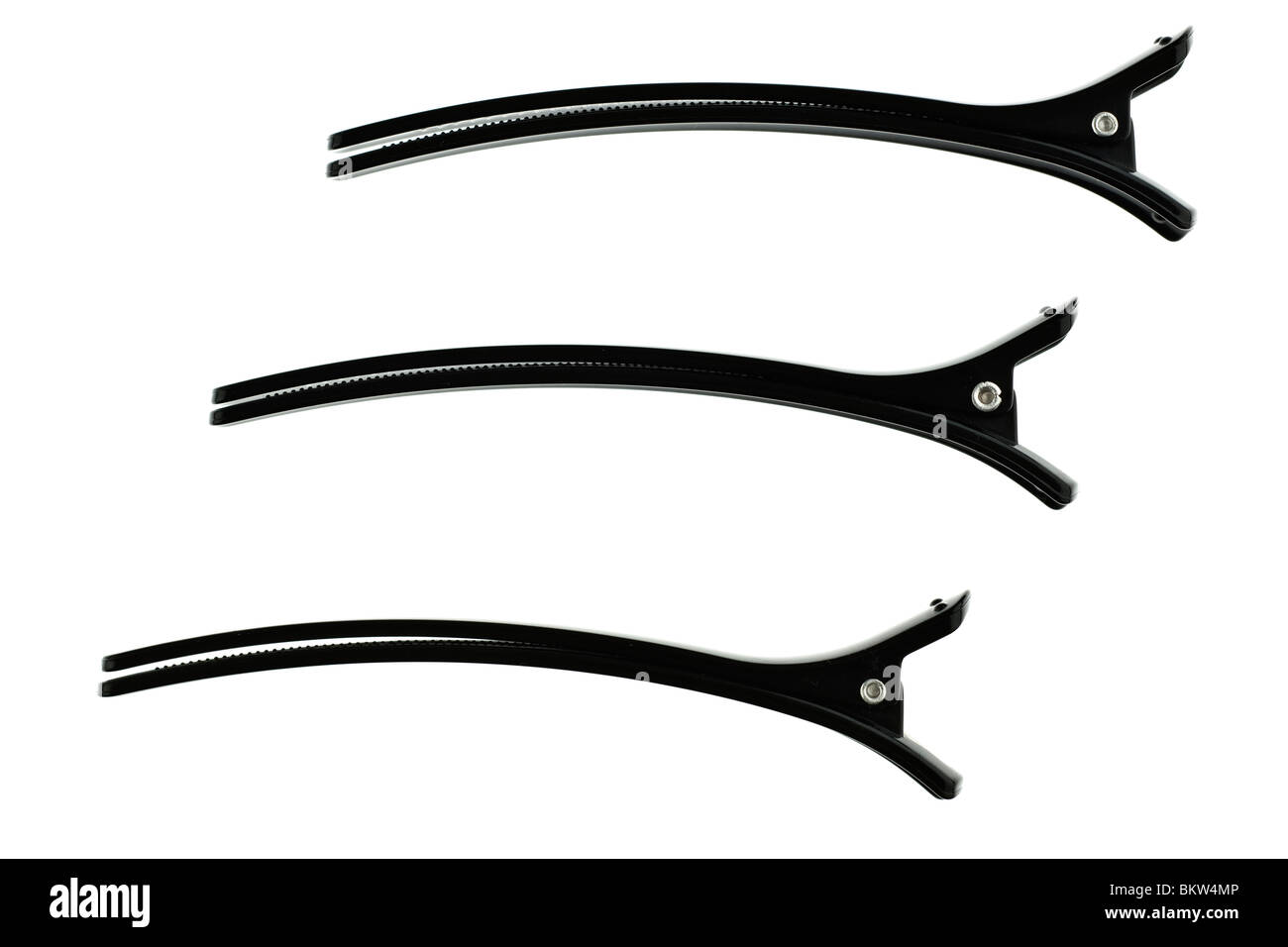 Trois printemps chargé de longs cheveux noirs poignées de cheveux en plastique Banque D'Images