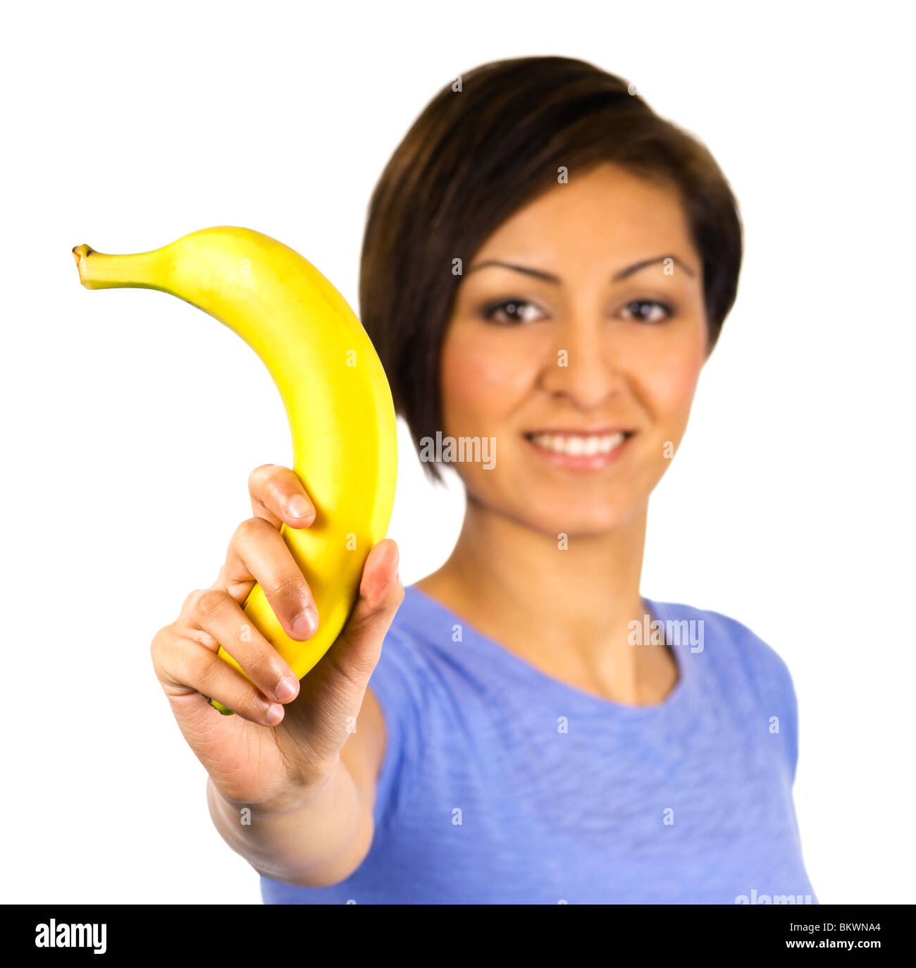 Une jeune femme peut contenir jusqu'à la banane Banque D'Images