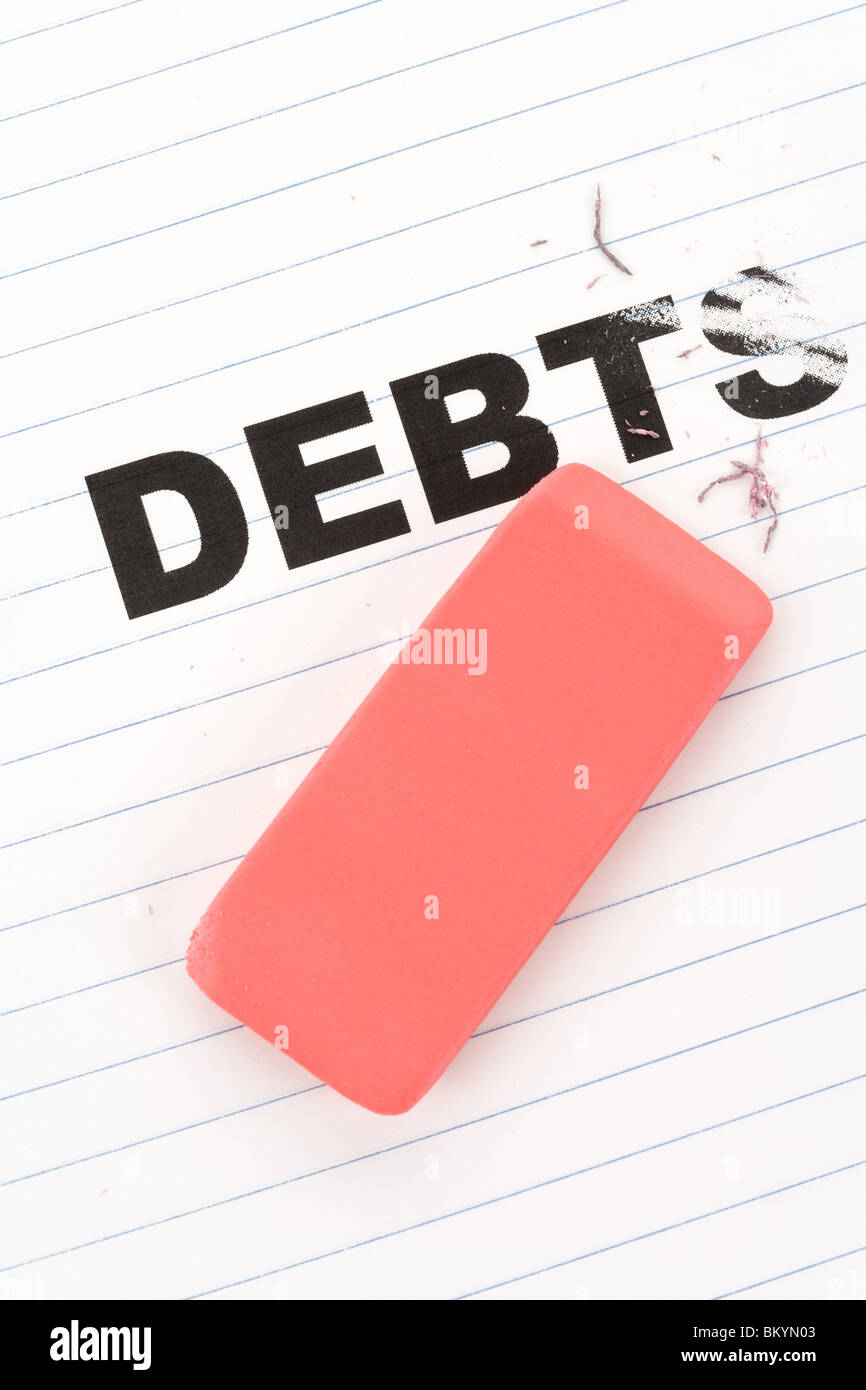 Eraser et word la dette, concept de réduire la dette Banque D'Images