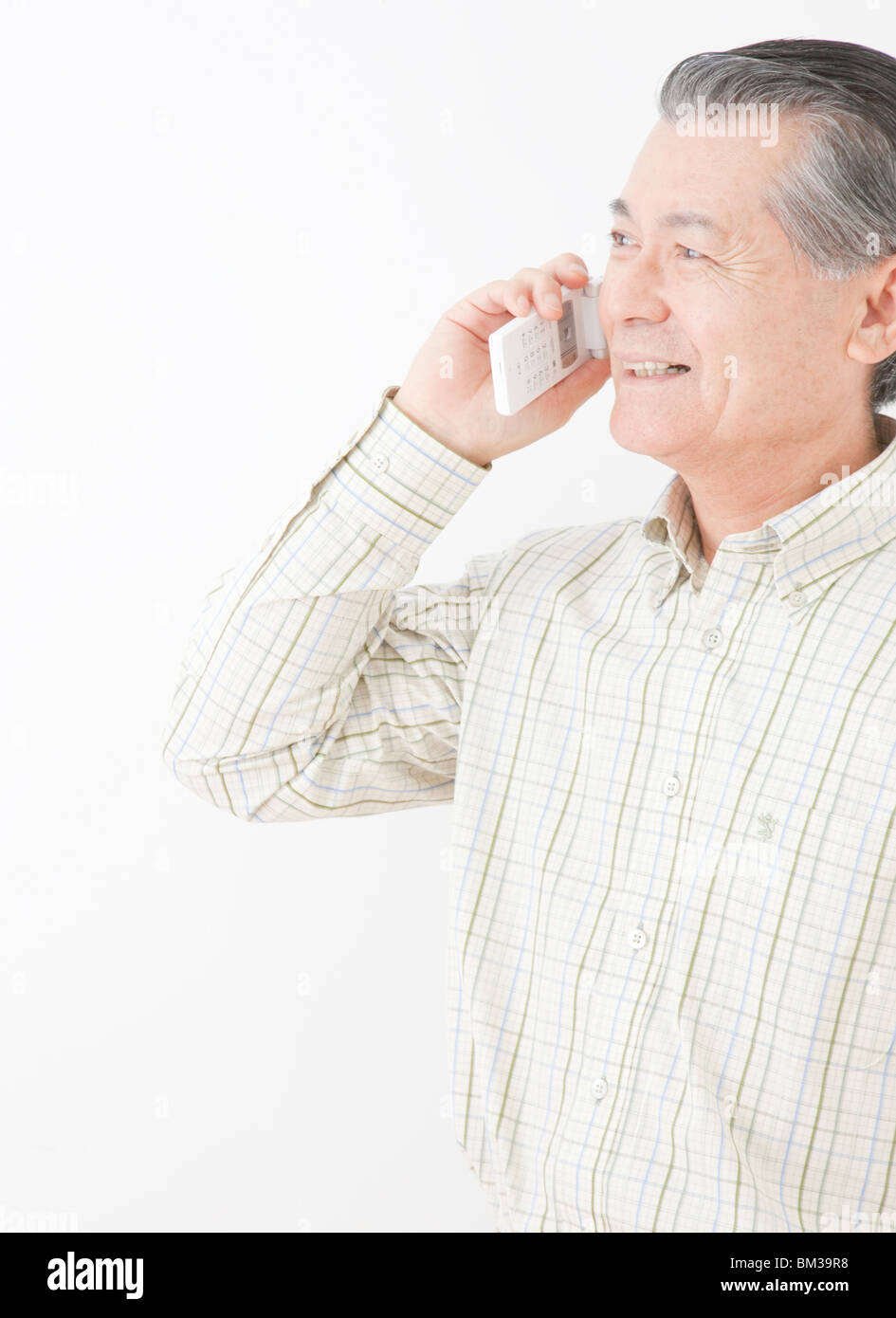 Senior man on cell phone Banque D'Images