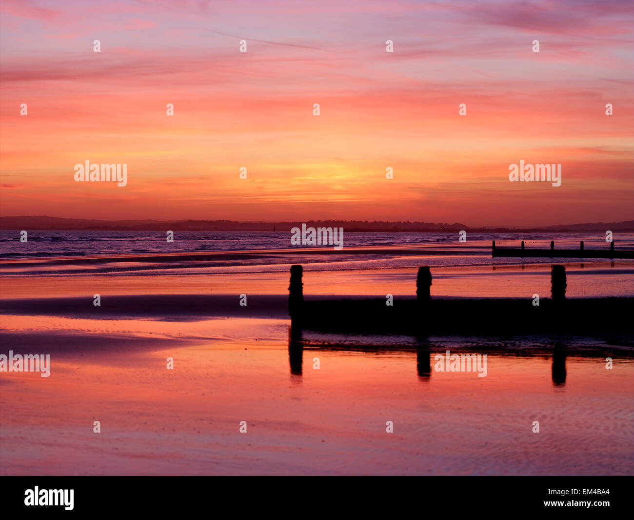 Camber Sands au coucher du soleil Banque D'Images