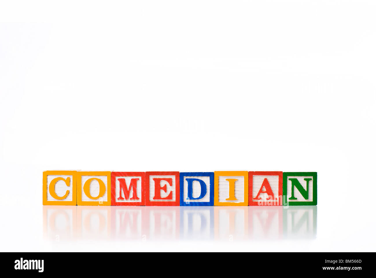 Enfants colorés blocks spelling comédien Banque D'Images
