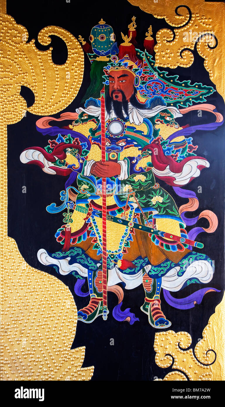 Porte avec personnage mythologique,peinture Chine Banque D'Images
