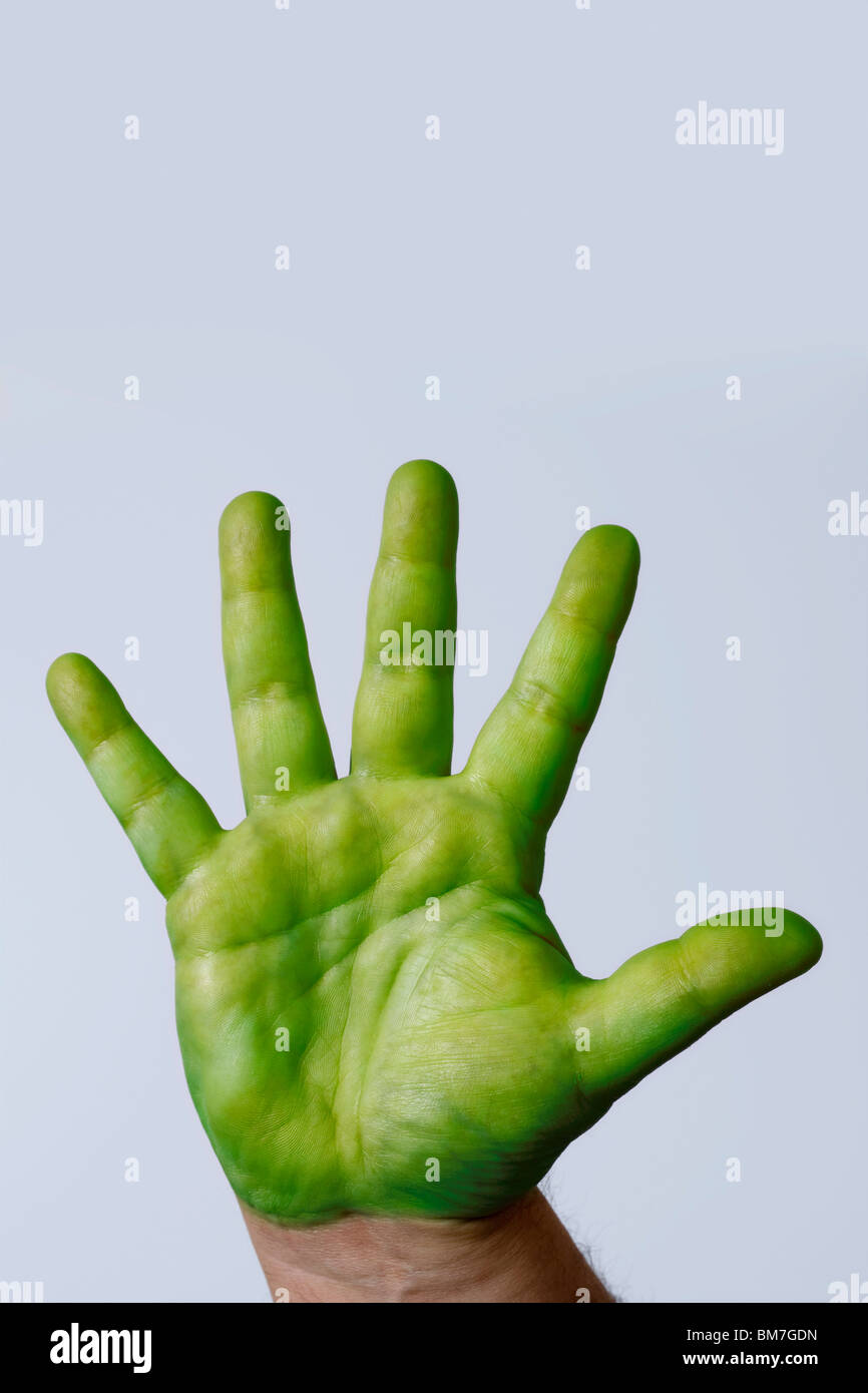 Une main verte Banque D'Images