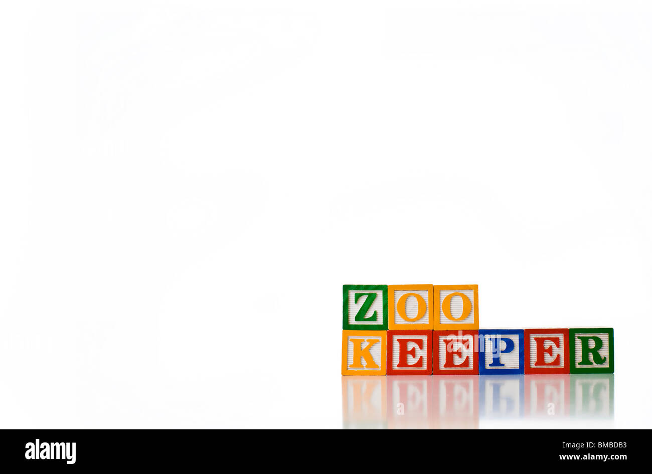 Enfants colorés blocks spelling ZOO KEEPER Banque D'Images